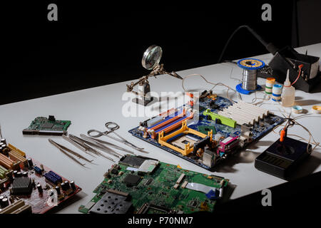 Circuit board and engineering equipment on table Stock Photo