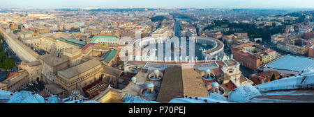VATICAN CITY, VATICAN - JANUARY 07, 2015: Looking down panorama view over Saint Peter square (Piazza San Pietro) and Rome City, Italy, from  St. Peter Stock Photo