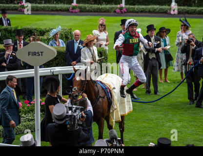 The first day of Royal Ascot in England celebrated by British Royalty when Top Jockey Frankie Dettori wins the St James' Palace Stakes. Stock Photo