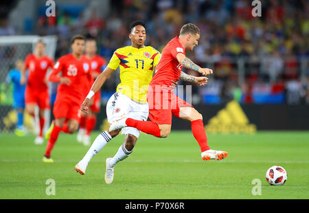 Colombia's Johan Mojica (left) and England's Kieran Trippier during the FIFA World Cup 2018, round of 16 match at the Spartak Stadium, Moscow. Stock Photo