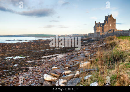 Ackergill Tower on the beach at Reiss near Wick in Caithness on the east coast of Scotland Stock Photo