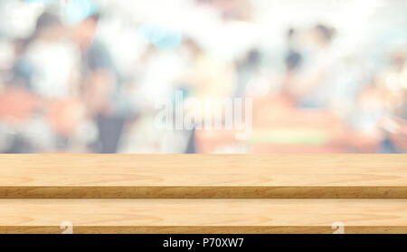 Empty step plank wood table top food stand with blur cafe restaurant background bokeh light,Mock up for product display or montage of design,Banner fo Stock Photo