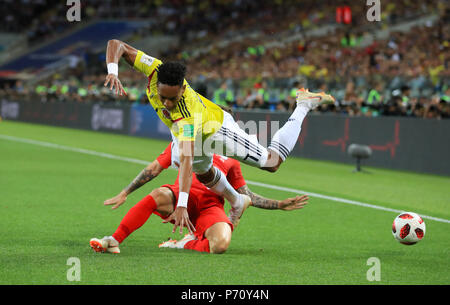 England's Kieran Trippier (left) and Colombia's Johan Mojica battle for the ball during the FIFA World Cup 2018, round of 16 match at the Spartak Stadium, Moscow. Stock Photo