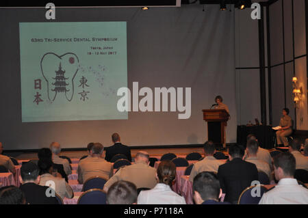 TOKYO, Japan (May 10, 2017) – U.S. Naval Hospital (USNH) Yokosuka Commanding Officer, Capt.  Rosemary Malone, delivers opening remarks during the 63rd Tri-Service Dental Symposium held at the New Sanno Hotel.    The 63rd Tri-Service Dental Symposium was held from May 10-12, 2017 and was hosted by USNH Yokosuka.  Approximately 120 dental providers from the Army, Navy, Air Force, Japan Self Defense Force, and local host nation community attended the three day event. Stock Photo