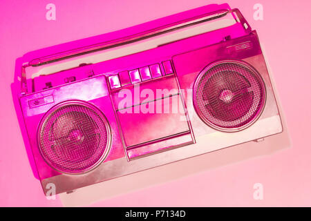 pink toned picture of retro boombox on pink background Stock Photo