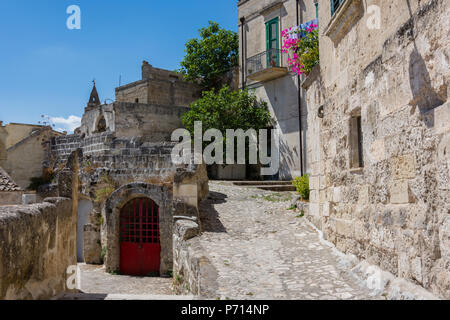 Typical alley with stairs of Matera old town, UNESCO World Heritage Site and European Capital of Culture 2019, Matera, Basilicata, Italy Stock Photo