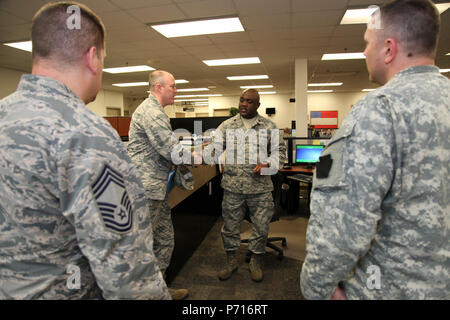 Colonel Christopher Jarratt greet members of the 111th ATKW/MSG to include Lt. Col Brian Wilson, CMSgt Scott Baughman, and Lt. Steven Shorter. Stock Photo