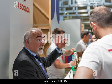 KIEV, UKRAINE - JUNE 02, 2018: Man sommelier presents its wine at Kyiv Wine Festival. Big festival of wine was organized by Good Wine company, 77 wine Stock Photo