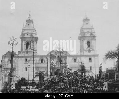 Svenska: Katedralen i Lima. Lima; Peru. Svenska expeditionen (1904–1905). English: The Basilica Cathedral of Lima is a Roman Catholic cathedral located in the Plaza Mayor of downtown Lima, Peru. Construction began in 1535, and the building has undergone many reconstructions and transformations since. It retains its colonial structure and facade. It is dedicated to St John, Apostle and Evangelist. The Swedish Expedition (1904–1905). from 1904 until 1905 151 Katedralen i Lima. Lima. Peru - SMVK - 002486 Stock Photo