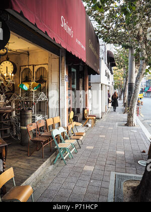 Seoul, South Korea - November 2017: Small shops selling antique in Itaewon Antique Street Stock Photo