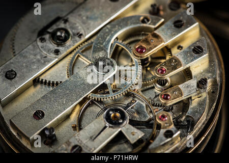 Detail view of the clockwork of an old open pocket watch Stock Photo