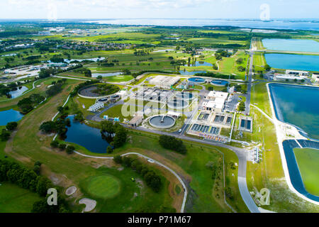 Modern lagoon waste water style sewage treatment plant in Bradenton Florida fl where normal household sewage is treated and filtered and recycled for