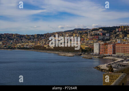Promenade and city view, Villa Comunale park at the waterfront seen from Castel dell Ovo fortress at Napoli Gulf, Naples, Campania, Italy, Europe Stock Photo