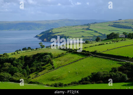 Pastures and fields and the little village of Cushendun, Antrim County, Ulster, Northern Ireland, United Kingdom, Europe Stock Photo