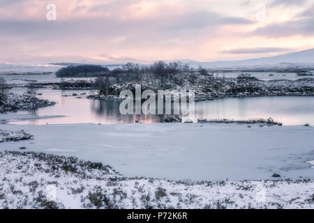 Loch Ba in winter snow at sunrise, Rannoch Moor, Highlands, Scotland, United Kingdom, Europe Stock Photo