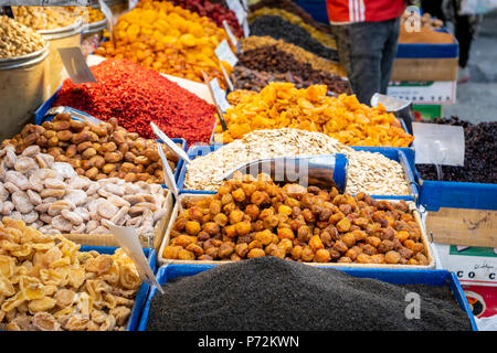 Street market stall selling dried fruits, nuts, spices in grand  bazaar in Tehran,  Iran, Middle East Stock Photo