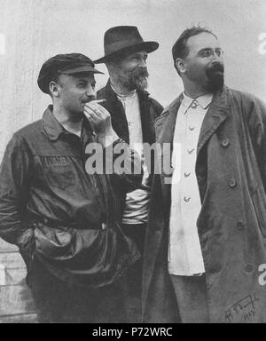 English: Old Bolsheviks: Nikolai Bukharin, the editor of Pravda and Projector. Ivan Skvortsov-Stepanov, the First People's Commissar (Minister) for Finance. Lev Karakhan, Deputy People's Commissar (Deputy Minister) for Foreign Affairs, the first Soviet Ambassador to China. Context: in one year after the photo’s publication, Joseph Stalin became de-facto dictator of the country. The lucky among three is Ivan Skvortsov-Stepanov since he had died from typhoid fever in Oct 1928 and buried in the Kremlin Wall Necropolis. Nikolai Bukharin confessed as “the enemy of the people” during Trial of Twenty Stock Photo