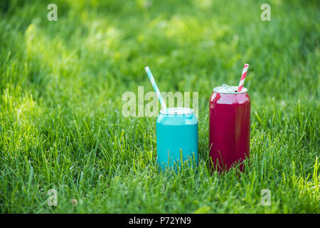 Colorful aluminum cans with straws Stock Photo by ©koya979 15878355