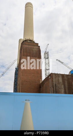 Battersea Power Station, London, 4th July 2018. Art Night photocall. Art Night and Hayward Gallery unveil South London based artist Suzanne Treister’s new colourful, large-scale 80 metre outdoor mural wrapped around the hoardings at Battersea Power Station ahead of the one-night only festival 'Art Night 2018' on Saturday 7 July. k, Vauxhall and Nine Elms. Credit: Imageplotter News and Sports/Alamy Live News Stock Photo