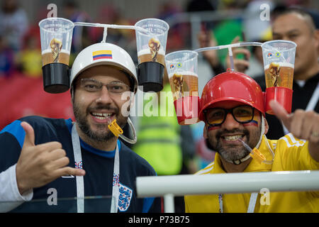 Moscow, Russland. 04th July, 2018. Colombian fans with beer mug holder, fan, fans, spectators, supporters, supporters, bust image, Colombia (COL) - England (ENG) 3: 4 iE, round of 16, game 56, on 03.07.2018 in Moscow; Football World Cup 2018 in Russia from 14.06. - 15.07.2018. | usage worldwide Credit: dpa/Alamy Live News Stock Photo
