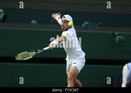 London, UK. 4th July 2018, All England Lawn Tennis and Croquet Club, London, England; The Wimbledon Tennis Championships, Day 3; Pella of Argentina returns to Marin Cilic of Croatia Credit: Action Plus Sports Images/Alamy Live News Stock Photo