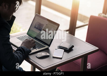 Business man working at office with laptop and documents on his desk, consultant lawyer concept Stock Photo