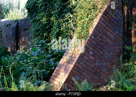 Brick wall support with Ivy Stock Photo