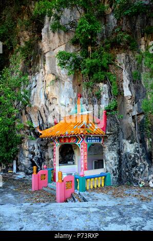 Grave tomb of founder couple of Rock of Heavenly Spirits Chinese Taoist Buddhist Temple at limestone hill base Ipoh Malaysia Stock Photo