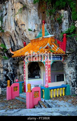Grave tomb of founder couple of Rock of Heavenly Spirits Chinese Taoist Buddhist Temple at limestone hill base Ipoh Malaysia Stock Photo