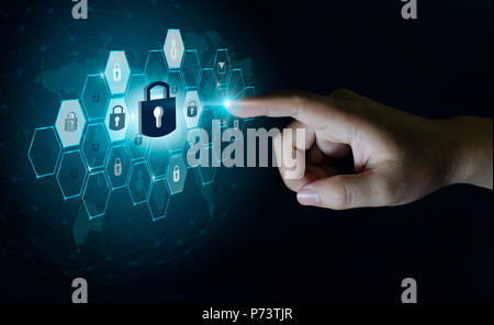 button on virtual screen pressed with finger Global network security world map Key lock security system abstract technology world digital link cyber s Stock Photo