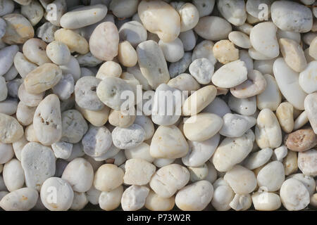Pebble stones, White stones and marble, Sea stones background Stock Photo