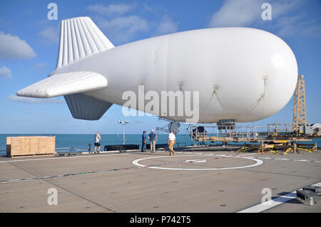 A TIF-25K tethered aerostat system is positioned on the high speed vessel Swift (HSV-2) at Naval Air Station Key West, Fla., April 23, 2013, before being tested at sea for future Operation Martillo missions. Martillo is a joint, interagency and multinational collaborative effort to deny transnational criminal organizations air and maritime access to the littoral regions of the Central American isthmus. (DoD Stock Photo