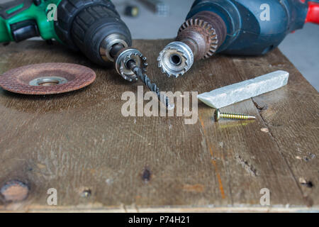 The industrial engineer using a mechanical drill machine Stock Photo