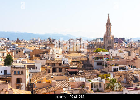 View over the rooftops and the Church of Santa Eulalia from  the terrace of the Cathedral of Santa Maria of Palma, also known as La Seu. Palma, Majorc Stock Photo