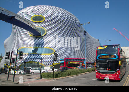 Birmingham, UK: June 29, 2018: Selfridges Department Store in Park Street part of the Bullring Shopping Centre. A bus is stopped at a traffic light. Stock Photo