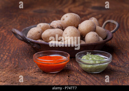 typical potatos from canary islands with mojo Stock Photo