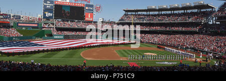 WASHINGTON, D.C. (April 6, 2015) Members of the United States Navy Ceremonial Band perform with the U.S. Coast Guard color guard during Opening Day festivities at Nationals Park in Washington, D.C. Stock Photo
