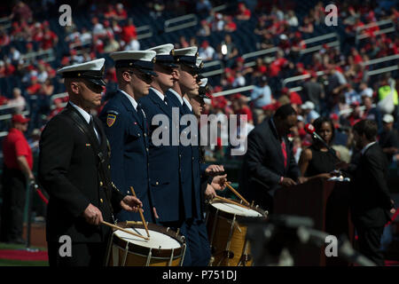 WASHINGTON, D.C. (April 6, 2015) Chief Musician Curt Duer, drummer with the United States Navy Ceremonial Band rehearses with members of the U.S. Coast Guard Ceremonial Guard on Nationals Field before the National/Mets game in preparation for Opening Day festivities at Nationals Park in Washington, D.C. Stock Photo