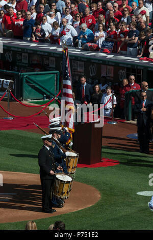 WASHINGTON, D.C. (April 6, 2015) Members of the United States Navy Ceremonial Band perform with the U.S. Coast Guard color guard during Opening Day festivities at Nationals Park in Washington, D.C. Stock Photo