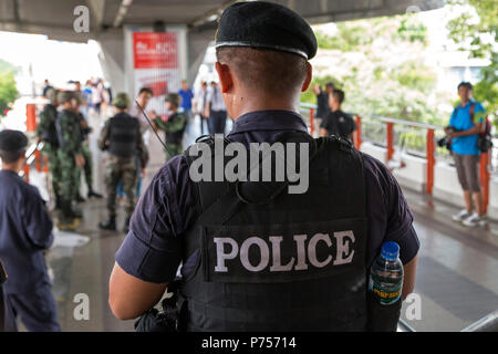 Police guarding Victoria Monument area during military coup, Bangkok, Thailand Stock Photo