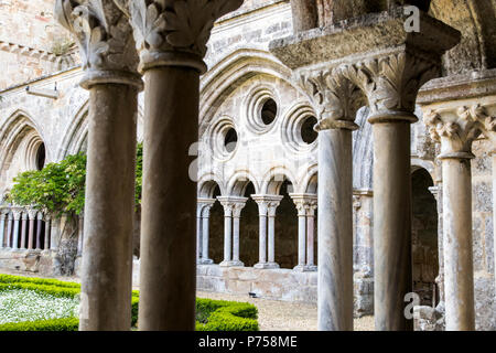 Interior view of the cloister of the Abbaye de Fontfroide, a former Cistercian monastery and abbey in Southern France Stock Photo