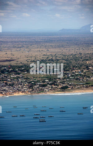 Fishing boats anchored off the shore of Ghana Stock Photo