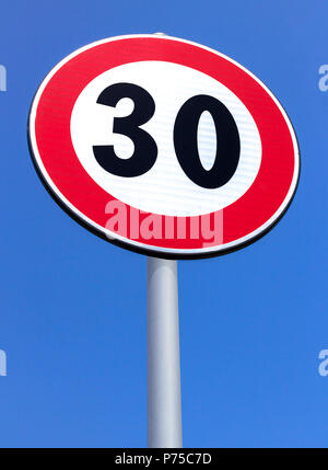 Road sign 30 Km speed limit .Traffic Limitation Order, Red Circle. Space for text. Stock Photo