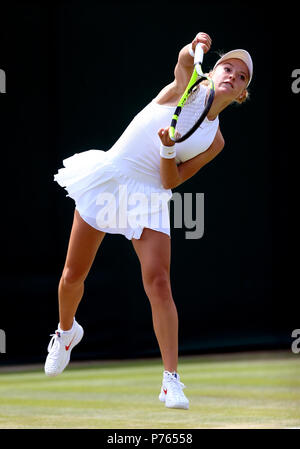 Katie Swan in action against on day three of the Wimbledon Championships at the All England Lawn Tennis and Croquet Club, Wimbledon. Stock Photo