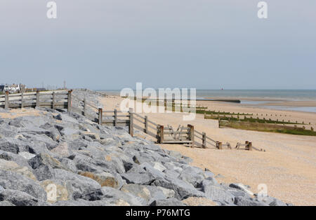 Groynes protecting the beach from erosion by the sea at Sheringham ...