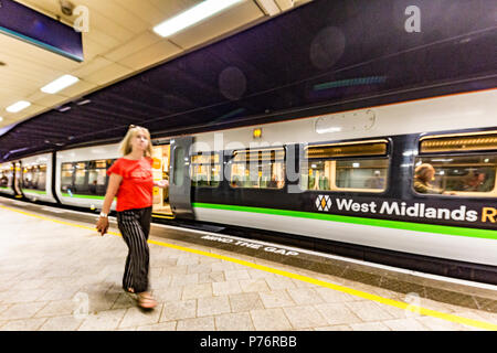 A platform view at Birmingham New Street Station , Birmingham, England, UK Stock Photo