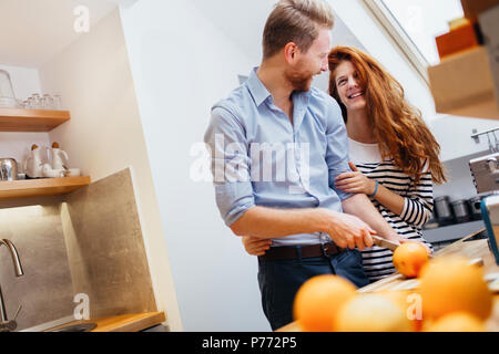 Couple making fresh organic juice Stock Photo