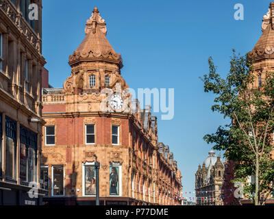 Clock on the corner of King Edward Street and Briggate from Albion Place Leeds West Yorkshire England Stock Photo