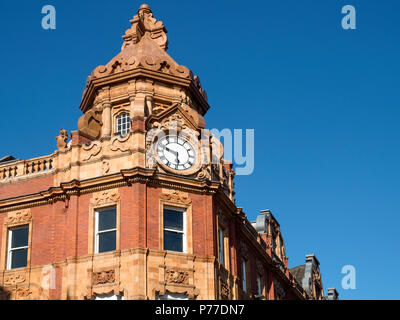 Clock on the corner of King Edward Street and Briggate in the Victoria Quarter Leeds West Yorkshire England Stock Photo