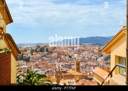 Architecture of Spanish beach resort Blanes in summertime. Sunny panorama from height of mountain of castle San Juan. Costa Brava, Catalonia, Spain. C Stock Photo